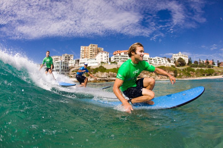 A group of friends at Let's Go Surfing.